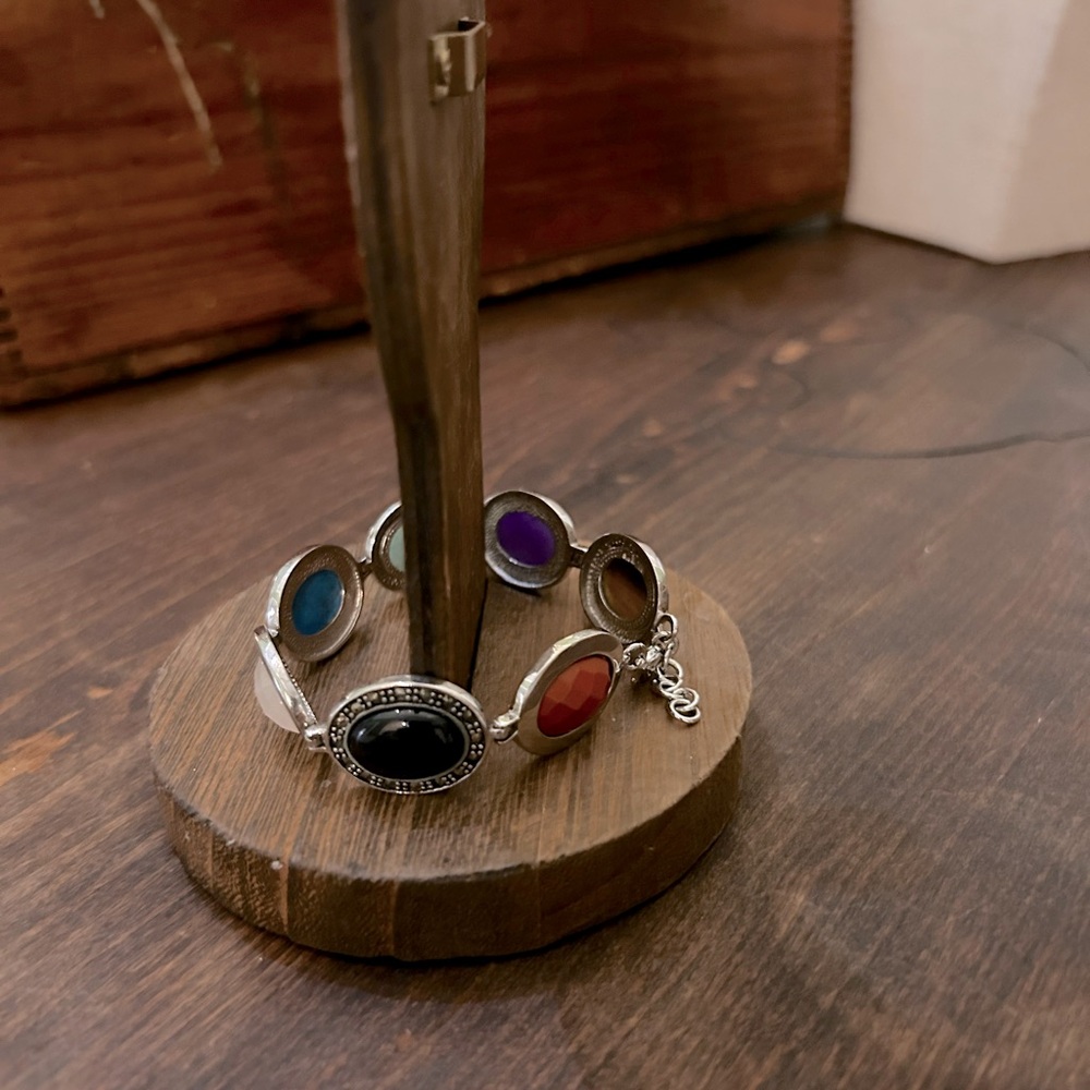 8 in Sterling silver bracelet with 7 separate stones. This has never been worn